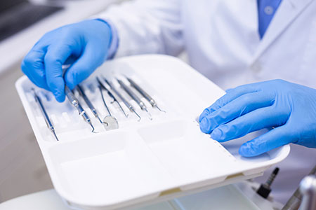 image of experienced dentist explaining dental procedure